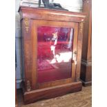 A Victorian inlaid walnut display cabinet, with cavetto moulded frieze, giltmetal mounts and