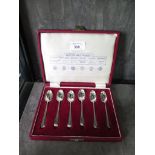 A cased set of silver coffee spoons showing six different hallmarks