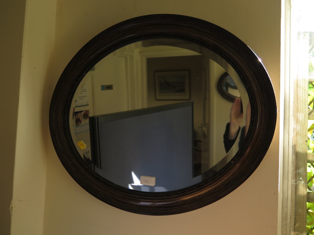 An oval oak framed mirror 67cm wide and another oval mirror 59cm wide - Image 2 of 2