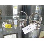 Three silver napkin rings and two plated napkin rings