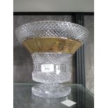 A Diaper pattern cut glass vase with gilded floral design band, on a circular foot, 19cm high