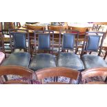 A set of four Victorian mahogany dining chairs, the square backs with upholstered panels,