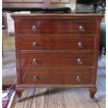 A miniature mahogany chest of drawers with four long graduated drawers on ogee bracket feet, 44.