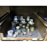 A set of six Coalport coffee cans and saucers, with rose decoration and eighteen various pill boxes,