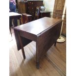 A George III mahogany gateleg table, the rectangular top on square chamfered legs 99cm wide