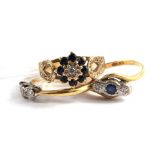 Two 18 carat gold diamond set rings and a 9 carat gold diamond and sapphire ring