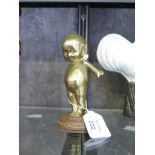 A brass car mascot, in the form of a baby with arms stretched behind 16cm high