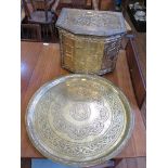 A brass circular tray with scroll decoration, 54.5cm diameter and brass covered coal box