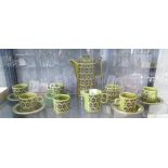 A Hornsea Heirloom pattern coffee service in green, with six coffee cups and saucers, coffee pot,