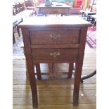 A 19th century oak side table, the two frieze drawers over square outswept legs, 48cm wide, 76cm