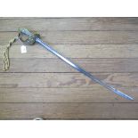A Royal Navy officer's short sword, length of blade 67.5cm with shagreen grip, lacks engraving on