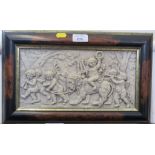 A framed plaque, depicting putti with instruments and a lion, 16 x 31cm