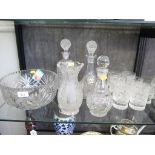 A matching set of six hi-ball, six liqueur, and twelve small wine glasses, cut glass decanters,