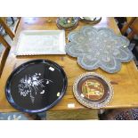 An Indian white metal tray embossed with elephants, peacocks and lions 45cm wide, another pierced