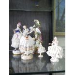 A Vienna figure of a lady dancing with lace skirt and cuffs 19cm high, a Dresden style figure with