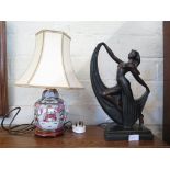 A small table lamp with a porcelain decorated base in the famille rose style complete with shade and