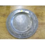 An 18th century pewter plate with moulded edge, touchmarks for Jacob Lampertz 31cm diameter