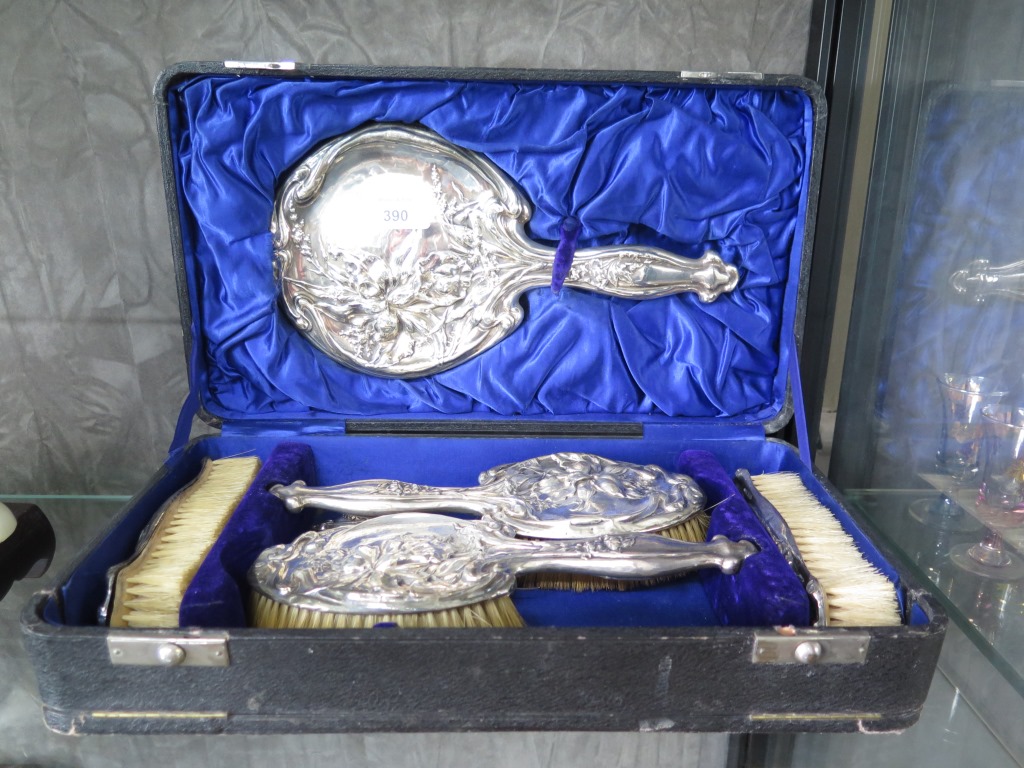 A ladies five piece silver brush and mirror set in presentation case