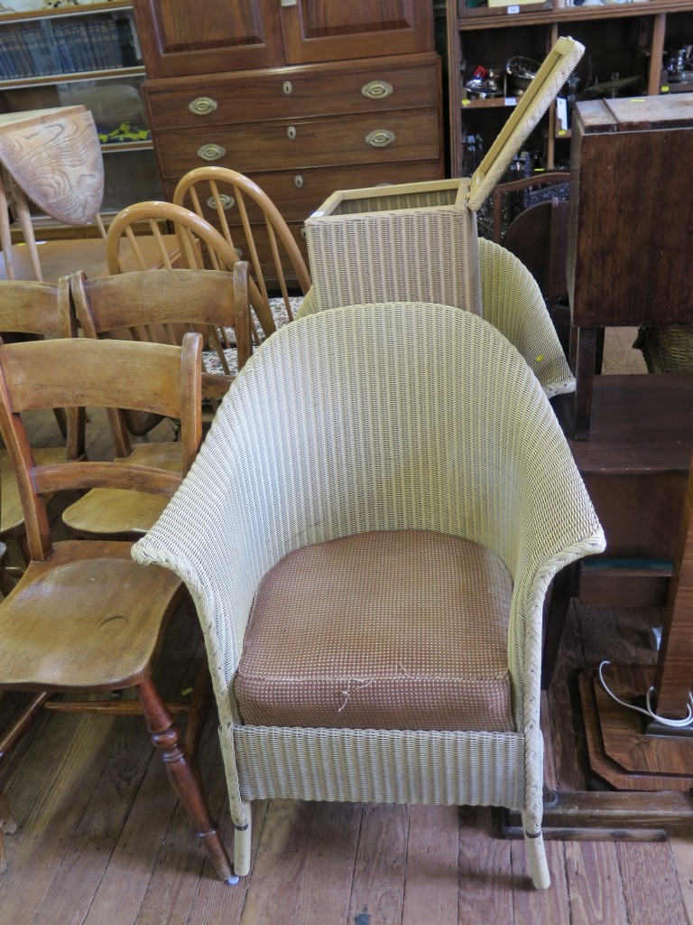 Two Lusty Lloyd Loom armchairs, a basket, and two basket-weave chairs