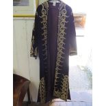 A brown velvet Middle Eastern robe, with silver and gold thread