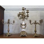 A seven light brass and white marble candelabra by Brevettato, in the French style 59cm high and a