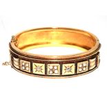 A Victorian bangle set with diamonds and pearls