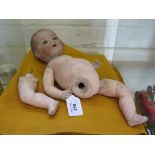 An Armand Marseille doll, 351, with closing blue eyes, open mouth and teeth, unclothed composite