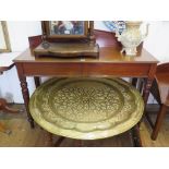 A Victorian mahogany serving table, the triangular back above a side frieze drawer on ring turned