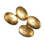 A pair of 18 carat gold oval cufflinks