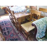 A stained pine dining table and eight chairs by Dixy, the table with frieze drawer 180cm x 100cm,