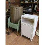 A Lloyd Loom type armchair, a corner basket and a bedside cabinet (3)