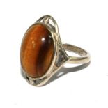 A silver ring with a tigers eye