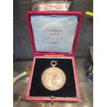 A silver cased motoring medal awarded to Mrs T.M. Crook for Meritorious Performance Reliability