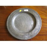 An 18th century pewter plate with moulded edge, touchmarks for Jacob Lampertz, 31cm diameter