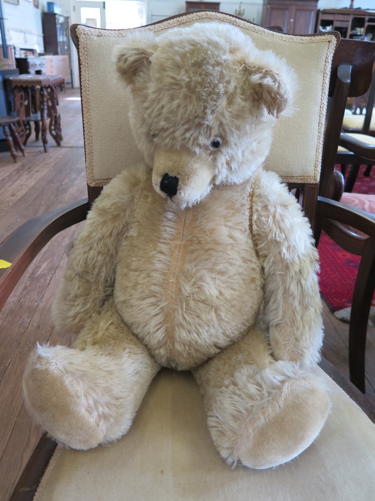 A large teddy bear, with growler 65cm long