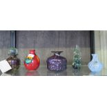 A Mdina glass vase and stopper 14cm high, another vase, a seahorse paperweight, a Poole Pottery vase