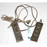 Two silver ingots and a pendant on silver neck chain