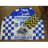 Portsmouth football club 2008 FA Cup Final: one football shirt, four flags and one banner, against