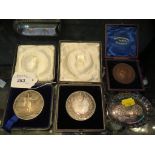 Three cased medallions together with a miniature silver tray regarding Queen Victoria's 1837-1897