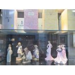 Four Lladro figures of girls, in original boxes, and three Coalport figures of ladies in original