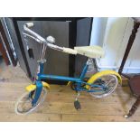 A 1960's Raleigh Elf bicycle, original colour