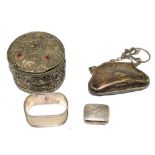 A collection of white metal items to include pill box napkin ring E.P.N.S. ladies purse, etc