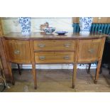 A George III style mahogany and satinwood crossbanded bowfront sideboard, the two central drawers