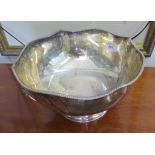 A silver plated punch bowl with lion mask handle