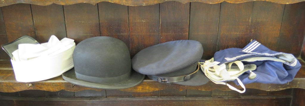 A BOAC pilots hat (lacks badge), a bowler hat, a Foreign Legion type hat, a sailor's collar