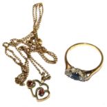 An 18 carat gold ring set with two diamonds and a sapphire together with a ruby pendant