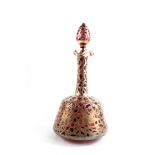 A ruby red mallet form decanter with silver overlay to the body depicting birds, flowers, etc
