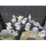 A collection of doll's house china tea services and vases, by Coalport, Spode, Royal Worcester and