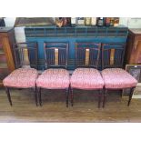 A set of four Edwardian inlaid salon chairs, the ivorine strung rail backs with anthemion and urn