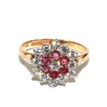 A 9 carat gold ring set with rubies and cubic zirconias